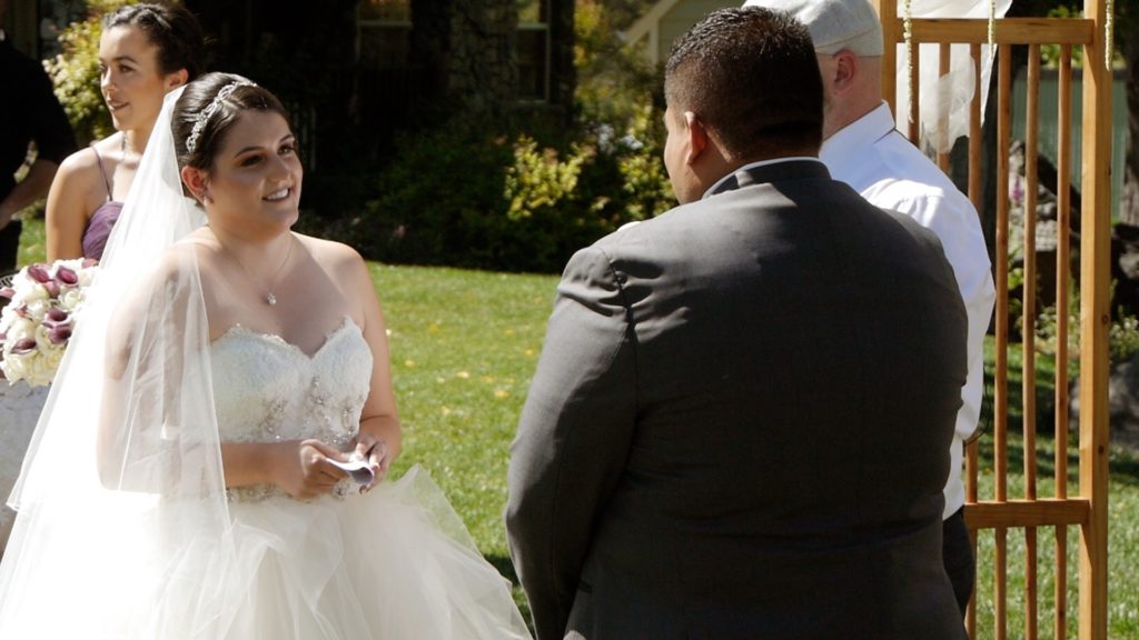 bride reacting during the vows