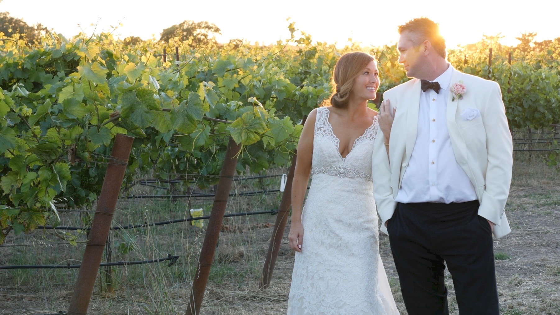 Bride and groom in sonoma county vineyard (deLoach)
