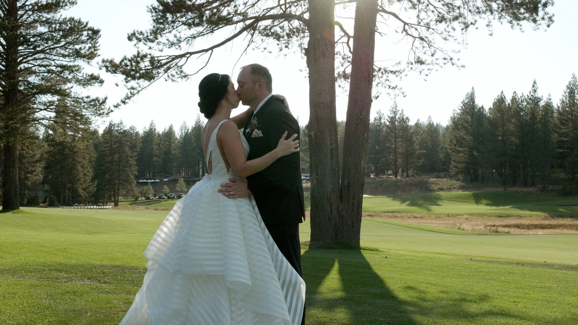 bride and groom sunset on golf course